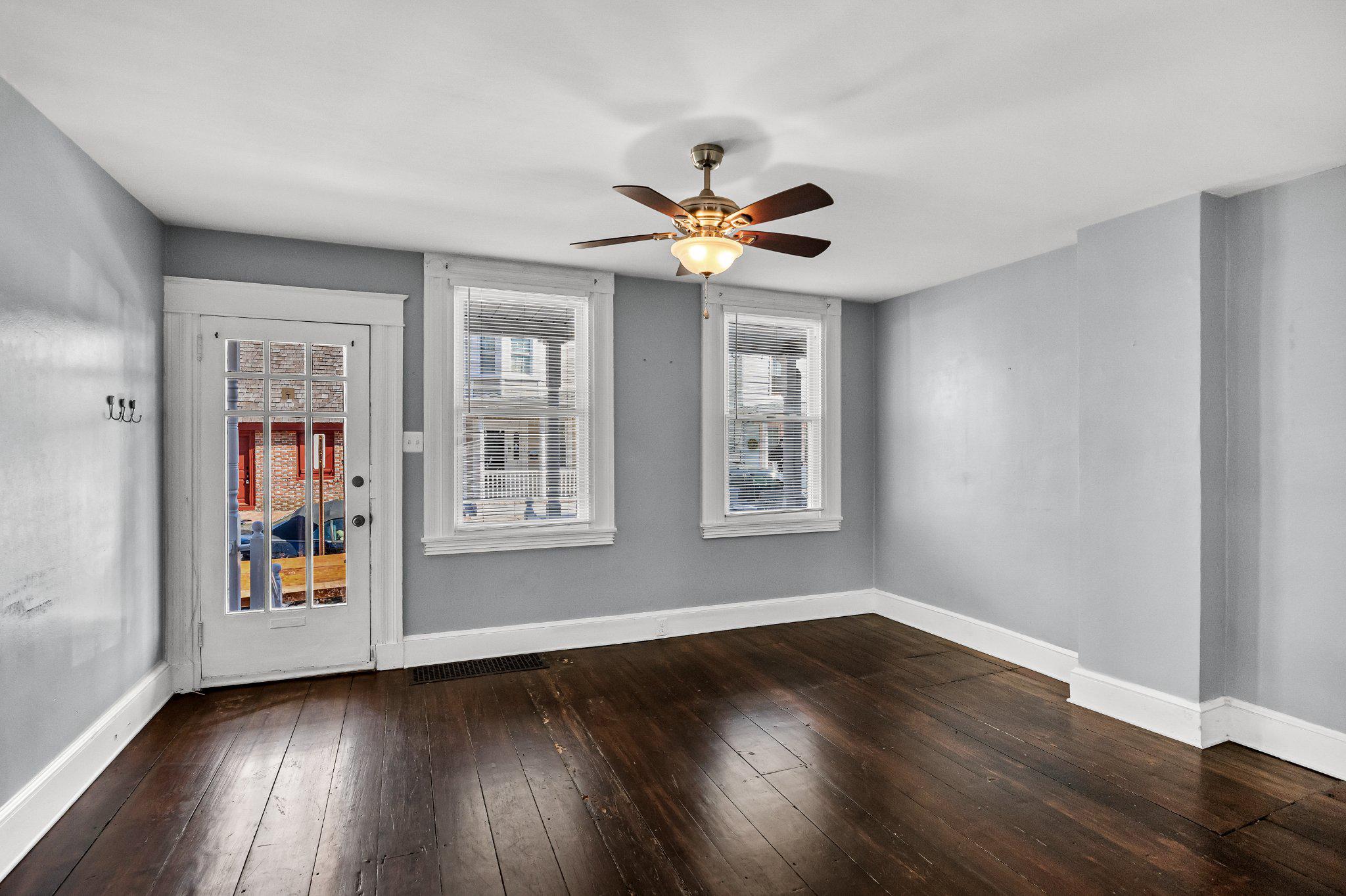 36 Brainerd Street Mount Holly, NJ 08060 - Photo 6 of 28 a view of an empty room with window and wooden floor