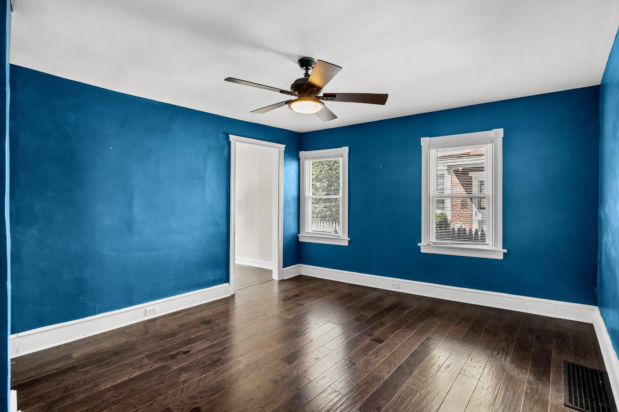 36 Brainerd Street Mount Holly, NJ 08060 - Photo 9 of 28 a view of an empty room with window and wooden floor