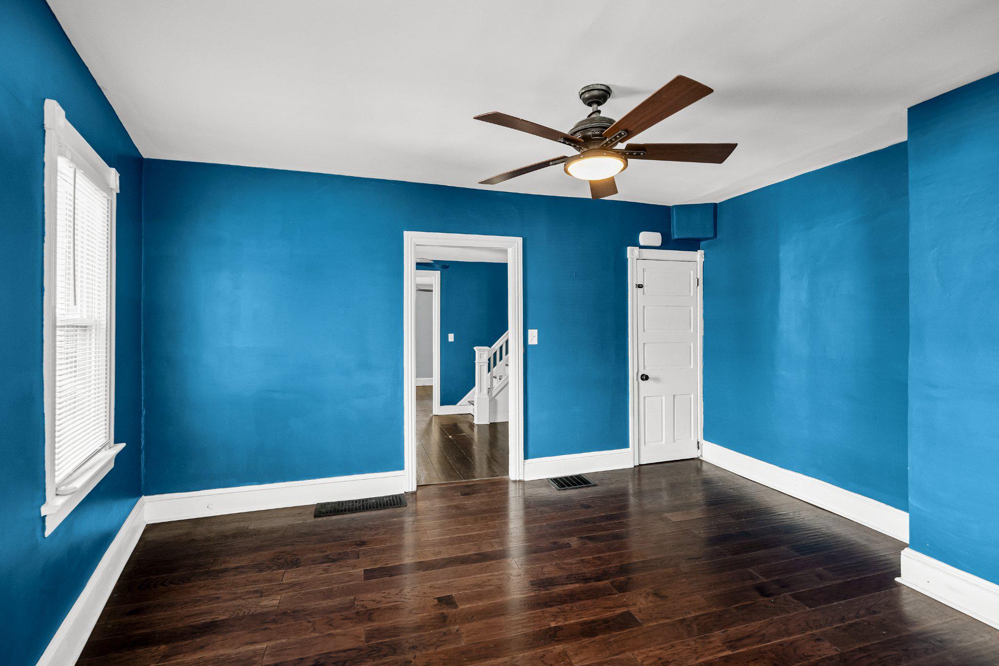 36 Brainerd Street Mount Holly, NJ 08060 - Photo 10 of 28 a view of a livingroom with wooden floor and a ceiling fan