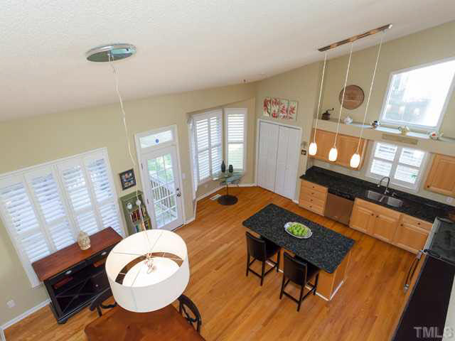 2337 Florida Court Raleigh, NC 27615 - Photo 12 of 25 This is a view of the kitchen from the 2nd floor loft area.