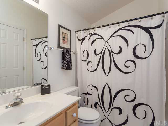 2337 Florida Court Raleigh, NC 27615 - Photo 19 of 25 The 2nd floor guest bath offers a tub/shower combination.