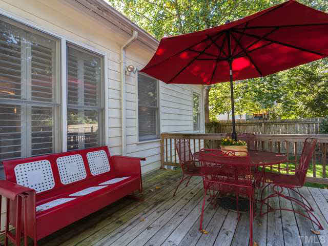 2337 Florida Court Raleigh, NC 27615 - Photo 22 of 25 Another improvement the seller added was the installation of a wooden deck. Prior to that, no deck existed.