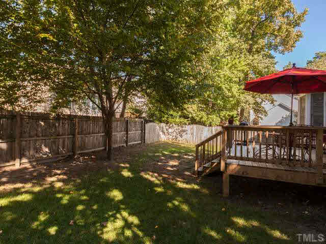 2337 Florida Court Raleigh, NC 27615 - Photo 23 of 25 The backyard is fully fenced and is the perfect place for fun and games as well as being a safe place for your pets to play.