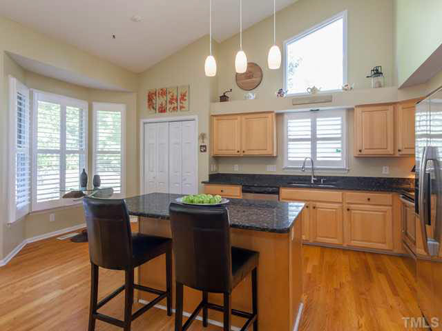 One of the improvements added by the homeowner were site finished hardwoods in the kitchen and granite counter tops. The kitchen has been fully updated and offers stainless appliances.