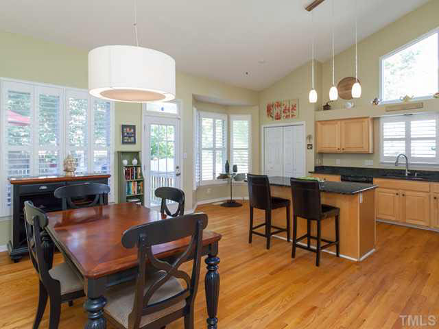 2337 Florida Court Raleigh, NC 27615 - Photo 9 of 25 The dining area is can easily accommodates a large table, buffer or china cabinet as this area is HUGE!