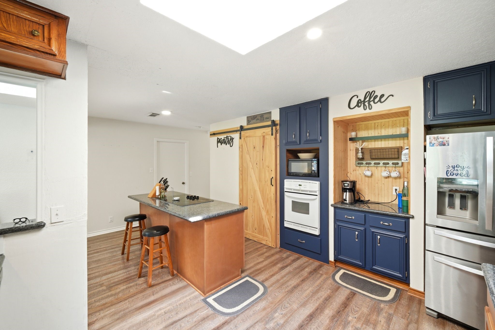 151 Tweedy Lane Sweeny, TX 77480 - Photo 21 of 50 Kitchen with island, coffee bar and walk-in pantry