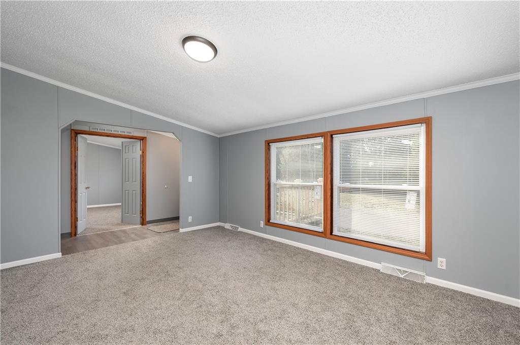 194 Andrusky Road Mercer, PA 16137 - Photo 4 of 29 a view of an empty room with a window