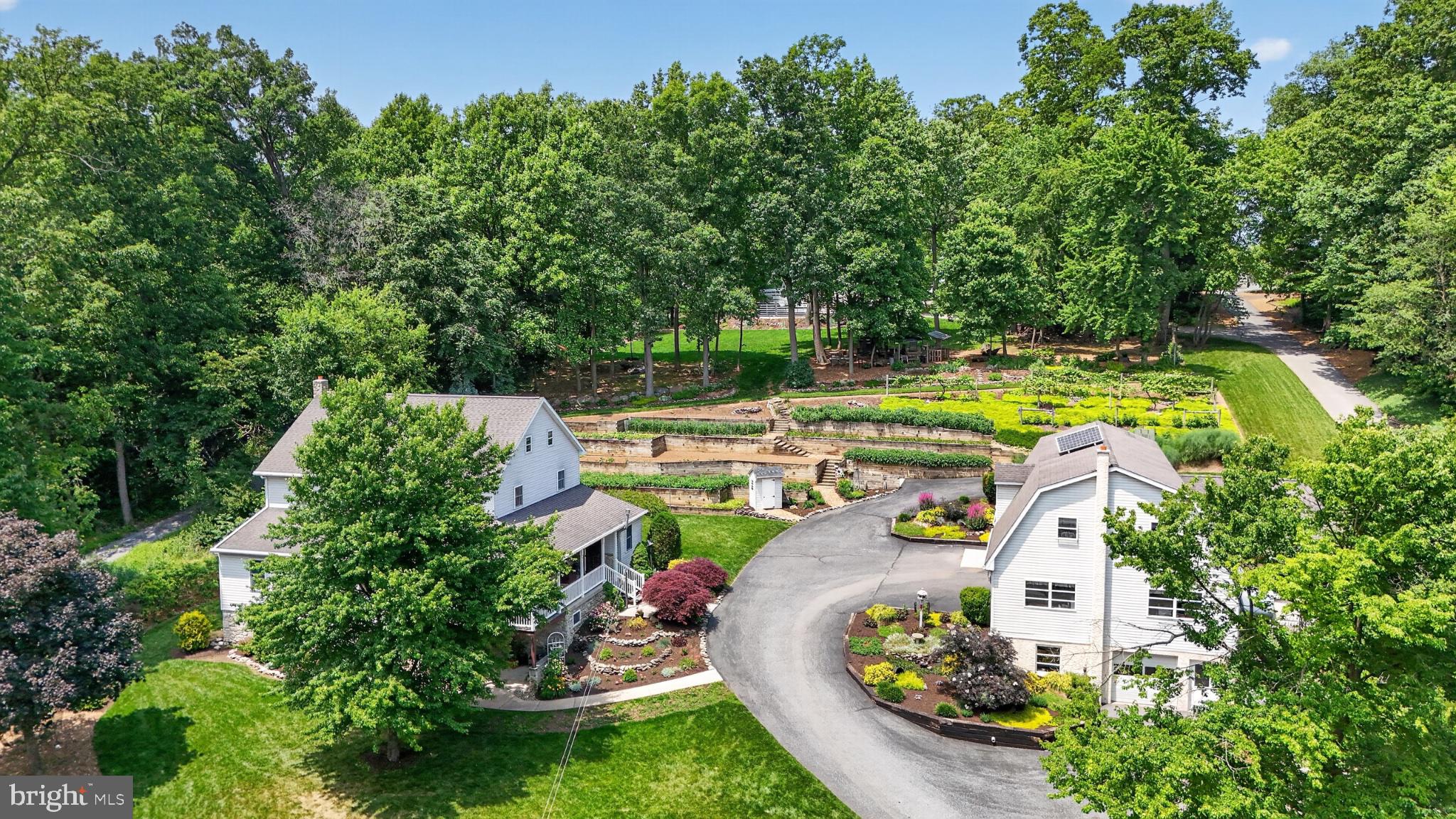 257 Hill Road New Holland, PA 17557 - Photo 1 of 94 Serene estate with lush gardens.