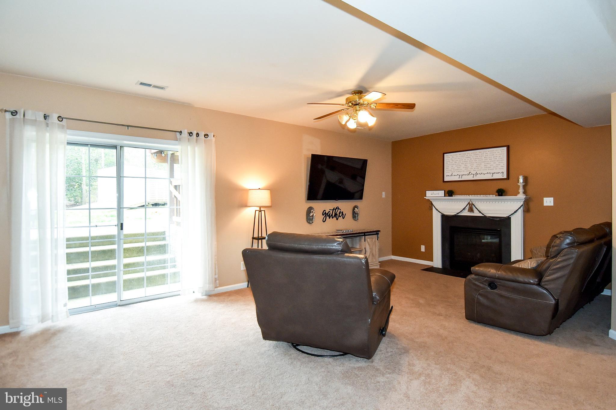8 Ridgeway Road Stafford, VA 22556 - Photo 22 of 31 Family room/Rec room with fireplace