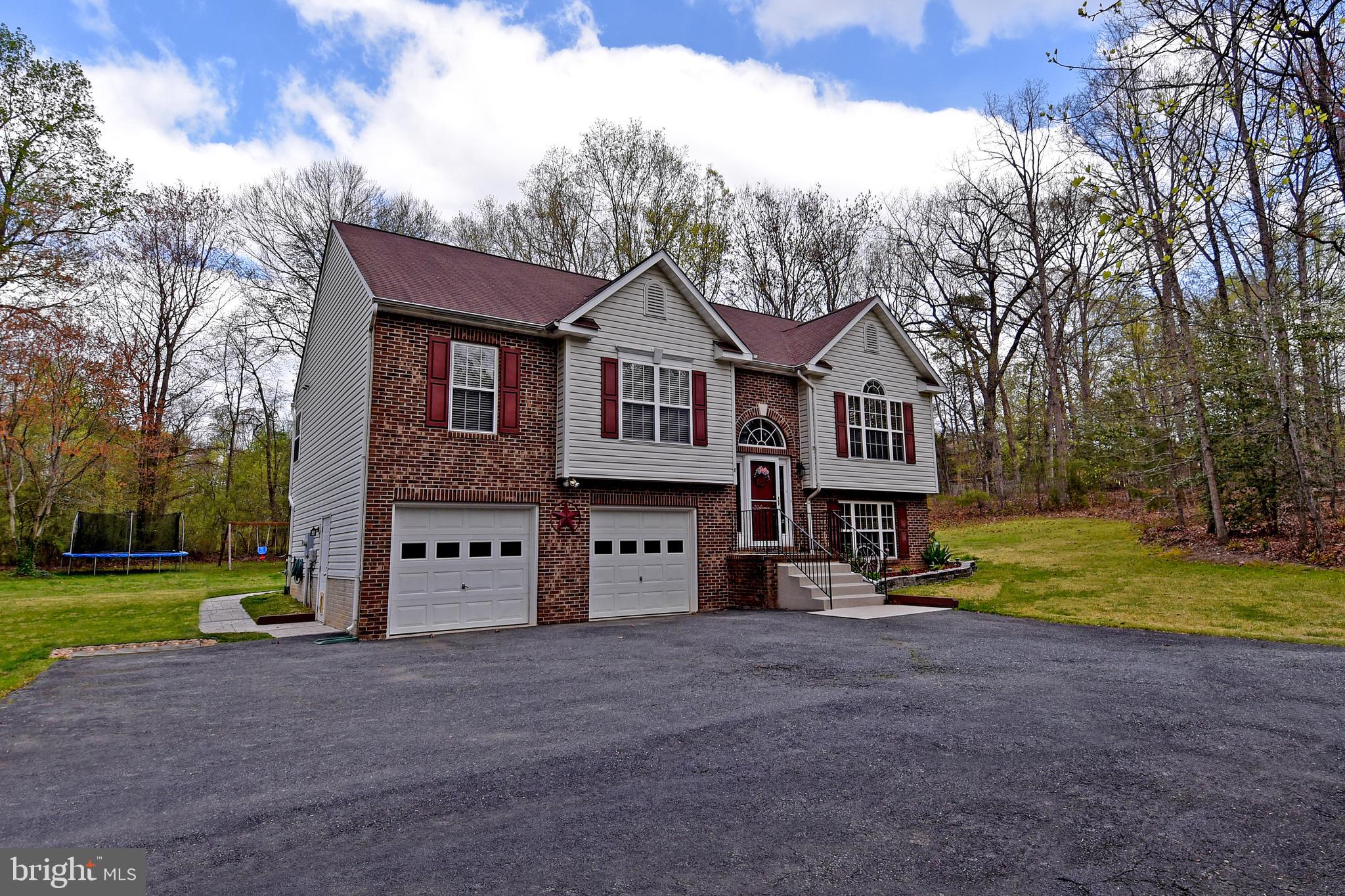 8 Ridgeway Road Stafford, VA 22556 - Photo 31 of 31 Front with walkway to rear yard/patio