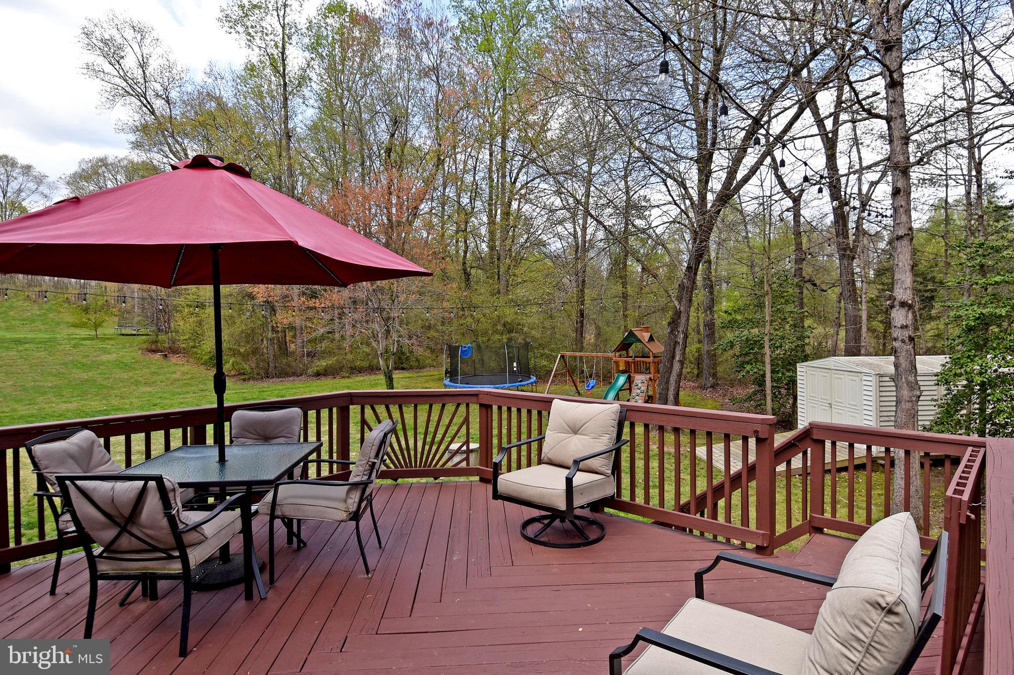 8 Ridgeway Road Stafford, VA 22556 - Photo 5 of 31 Rear deck overlooks spacious lawn & woods