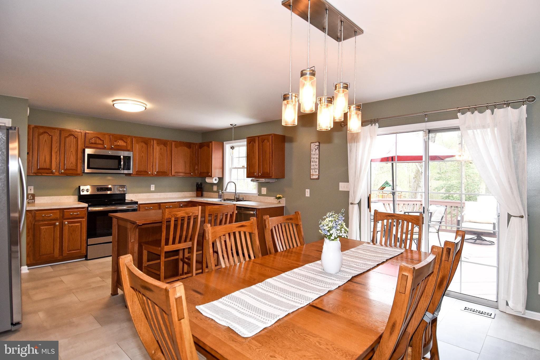 8 Ridgeway Road Stafford, VA 22556 - Photo 6 of 31 Large dining area opens to kitchen and rear deck