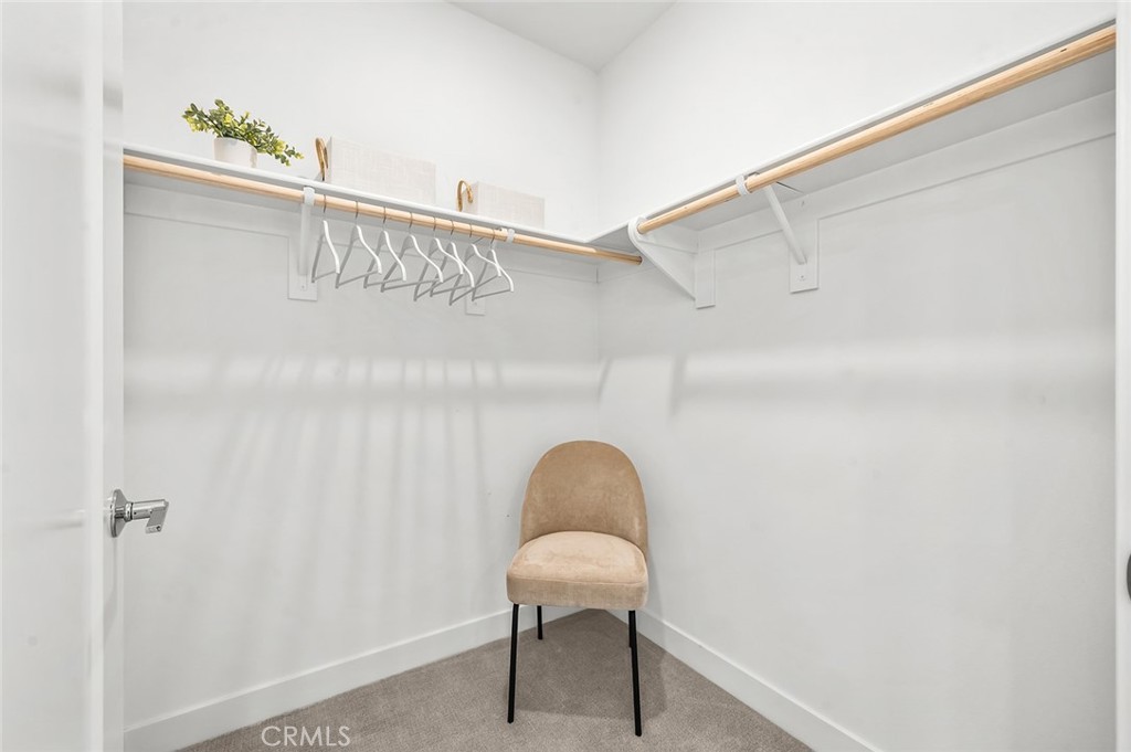 3604 Rivington Irvine, CA 92612 - Photo 24 of 54 a bathroom with a chair and a table