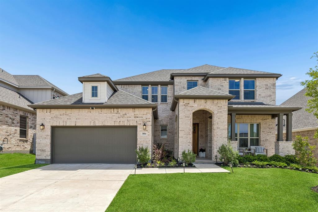3004 Windy Rdg Road McKinney, TX 75071 - Photo 1 of 40 front view of a house with a yard