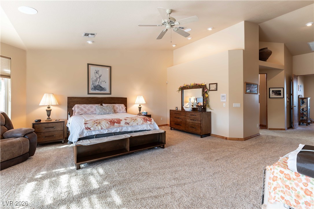 13675 Racel Street Las Vegas, NV 89166 - Photo 23 of 55 Carpeted bedroom featuring ceiling fan, recessed lighting, and high vaulted ceiling