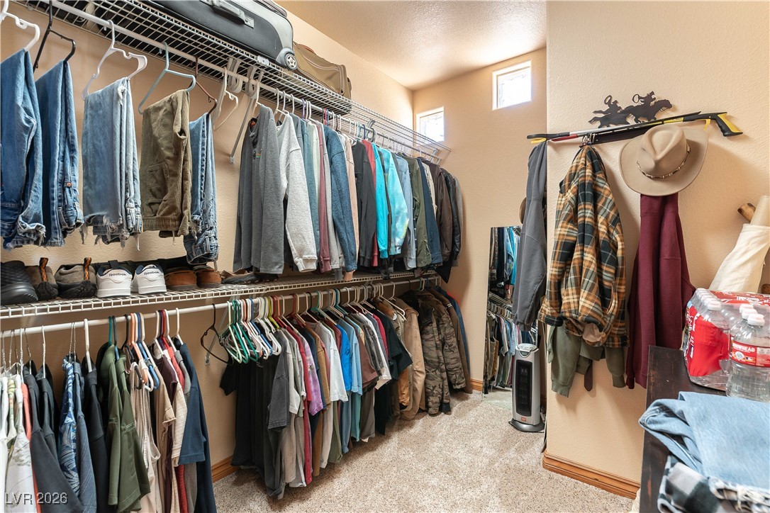 13675 Racel Street Las Vegas, NV 89166 - Photo 25 of 55 Walk in closet with light carpet