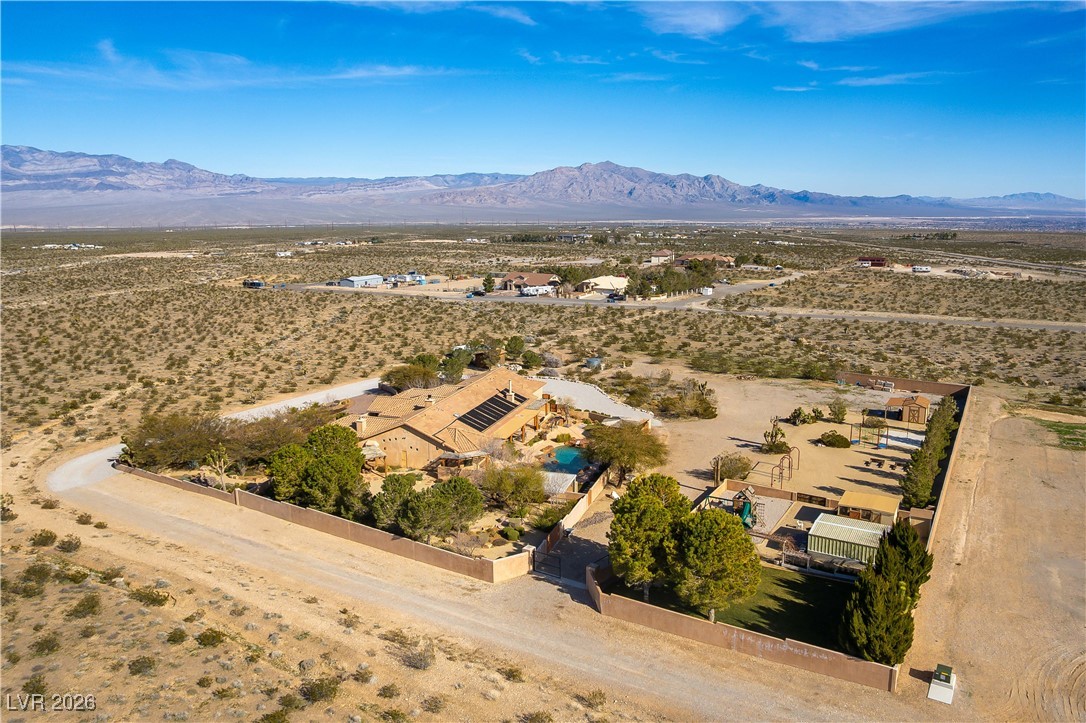 13675 Racel Street Las Vegas, NV 89166 - Photo 54 of 55 View of rural area featuring mountains and nearby suburban area