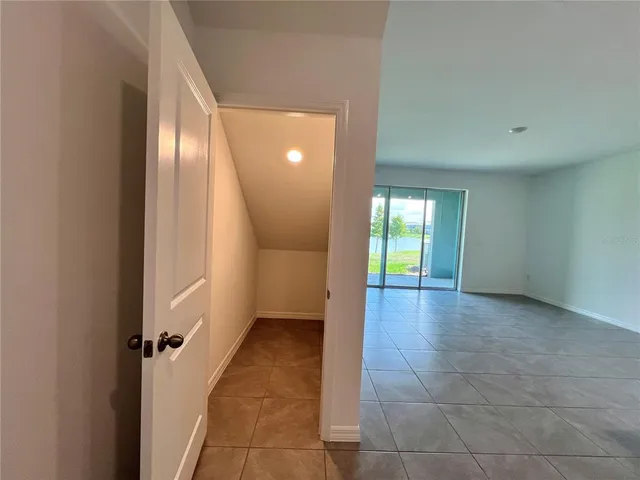 a view of a room with an empty space