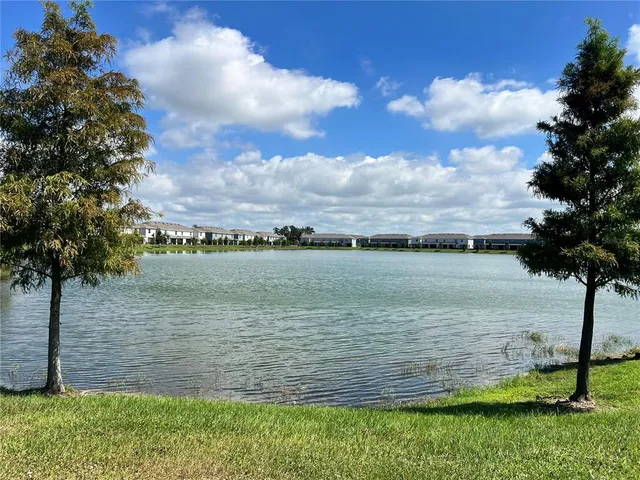 a view of a swimming pool from a balcony