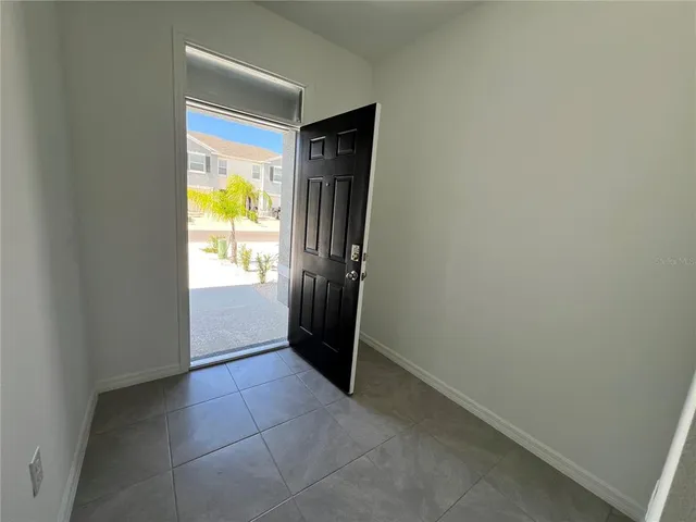 a view of an entryway with a window