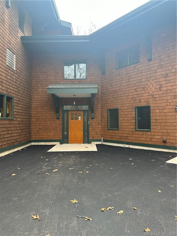 83 Brookfield Road Bolton, CT 06043 - Photo 1 of 1 a view of a house with a garage and fireplace
