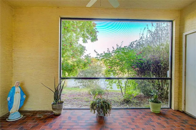 a view of a window with wooden floor