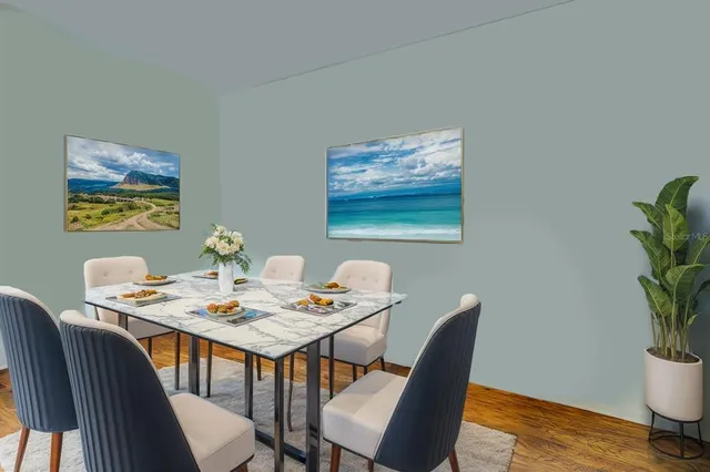 a view of a dining room with furniture