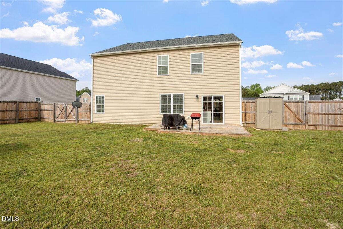 205 Battery Way Bunnlevel, NC 28323 - Photo 3 of 37 a view of a house with a yard