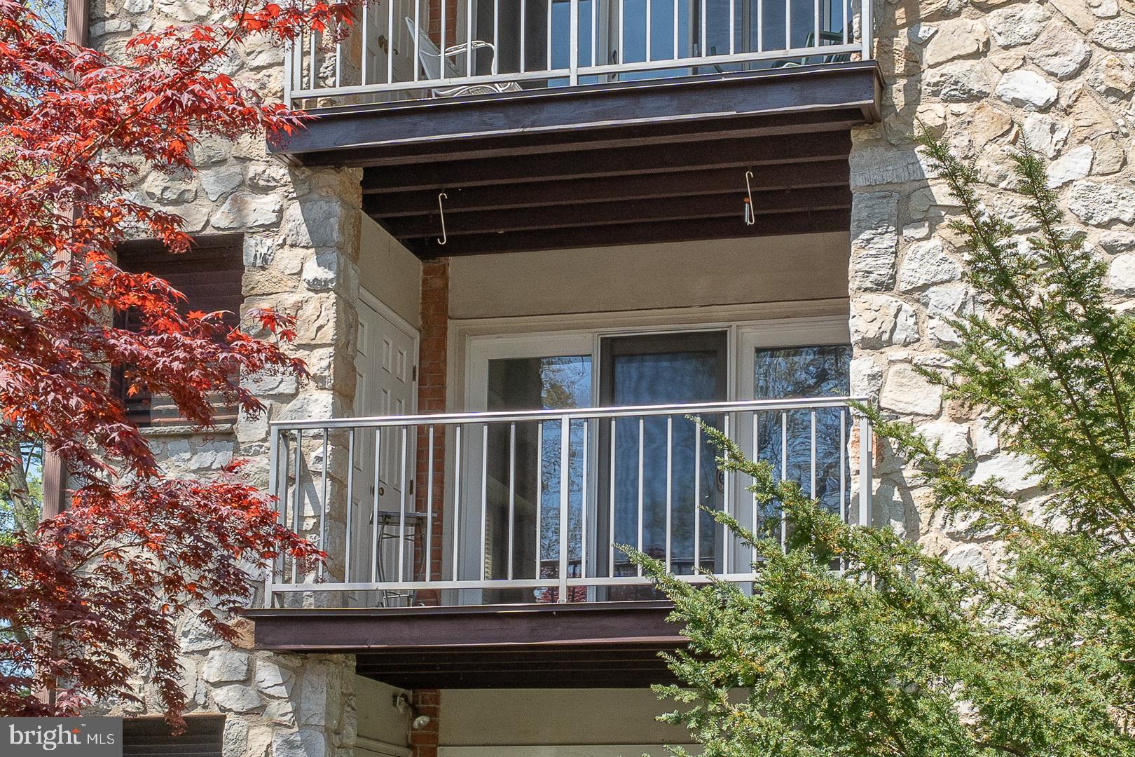 441 Drummers Lane, Unit 441 Wayne, PA 19087 - Photo 12 of 32 a view of a back yard of the house
