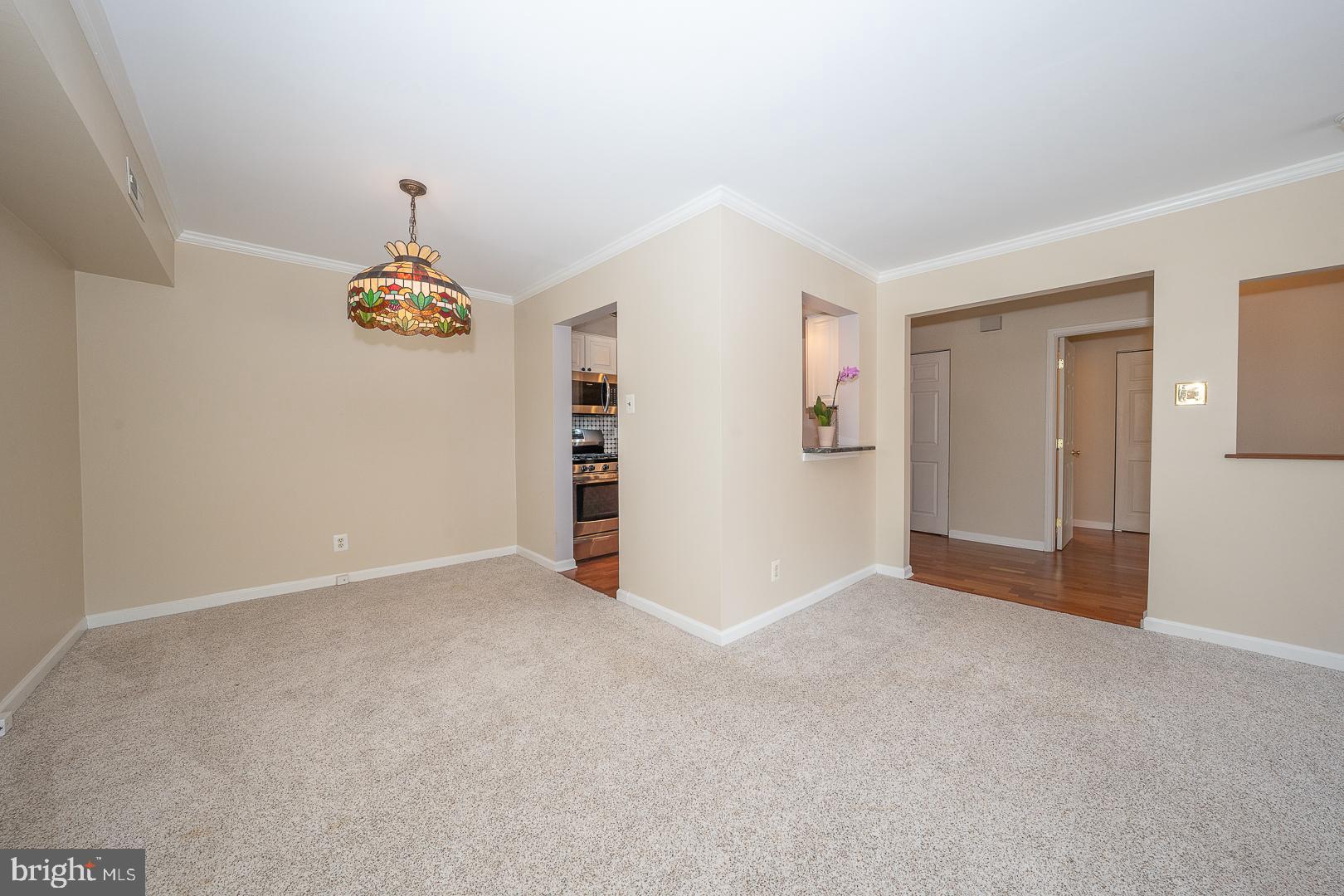 441 Drummers Lane, Unit 441 Wayne, PA 19087 - Photo 13 of 32 a view of an empty room with a window