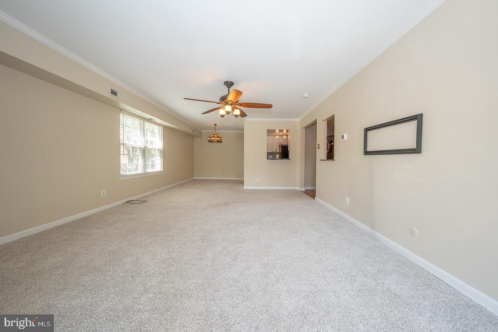 441 Drummers Lane, Unit 441 Wayne, PA 19087 - Photo 14 of 32 a view of an empty room with a window