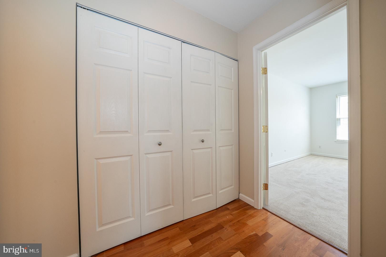 441 Drummers Lane, Unit 441 Wayne, PA 19087 - Photo 19 of 32 an empty room with wooden floor