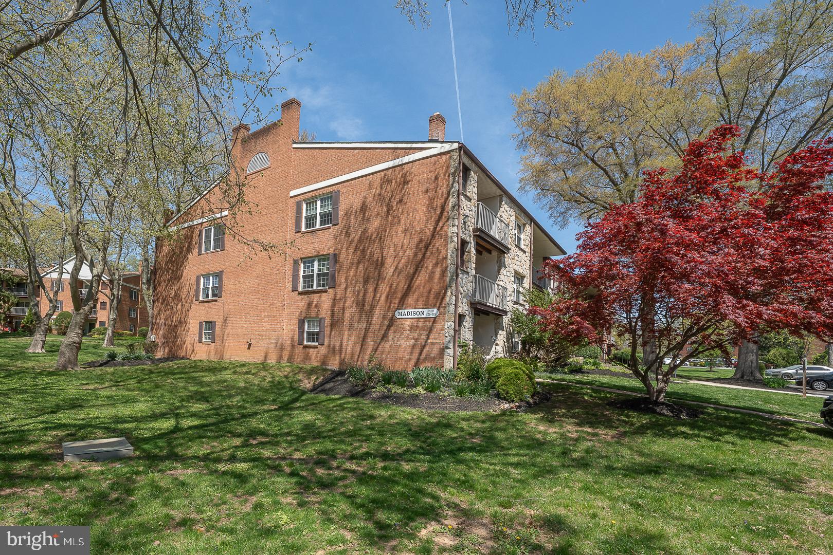 441 Drummers Lane, Unit 441 Wayne, PA 19087 - Photo 3 of 32 a view of a house with a yard