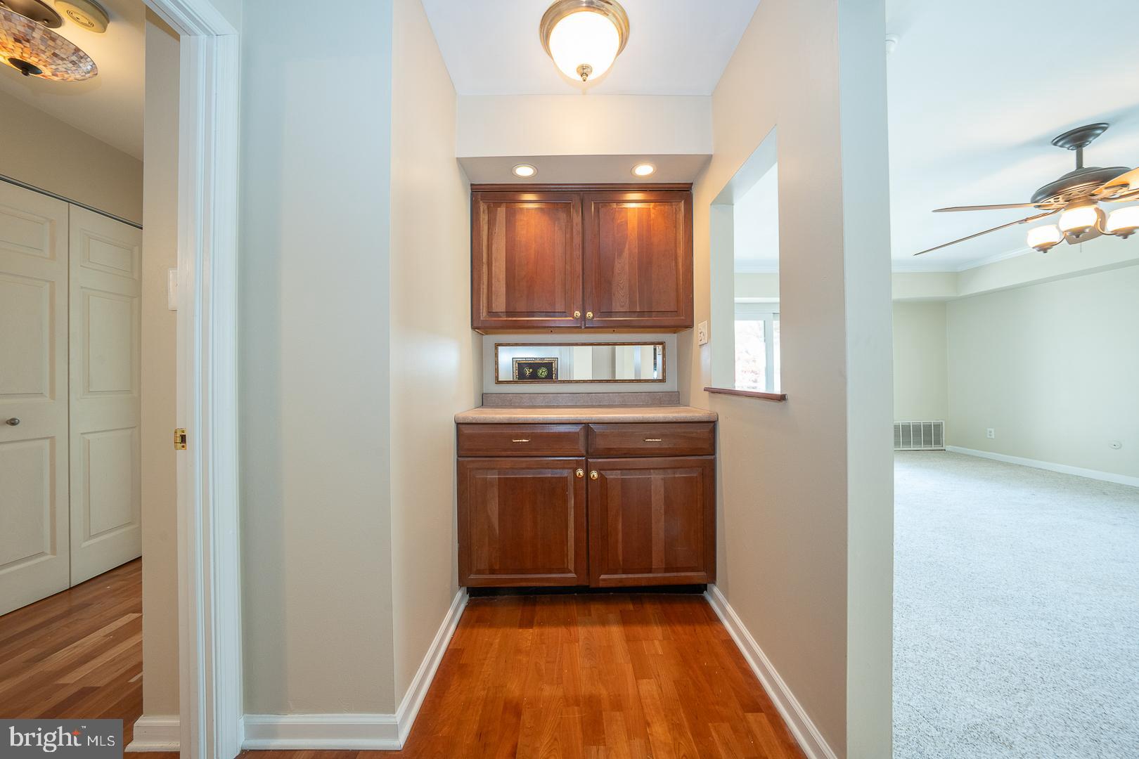441 Drummers Lane, Unit 441 Wayne, PA 19087 - Photo 7 of 32 a view of a kitchen with a sink and a window