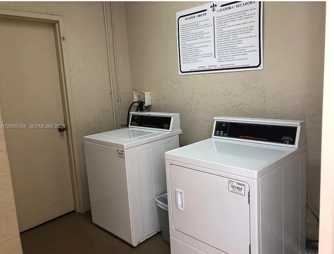 7705 Southwest 86th Street, Unit B211 Miami, FL 33143 - Photo 14 of 22 a utility room with dryer and washer