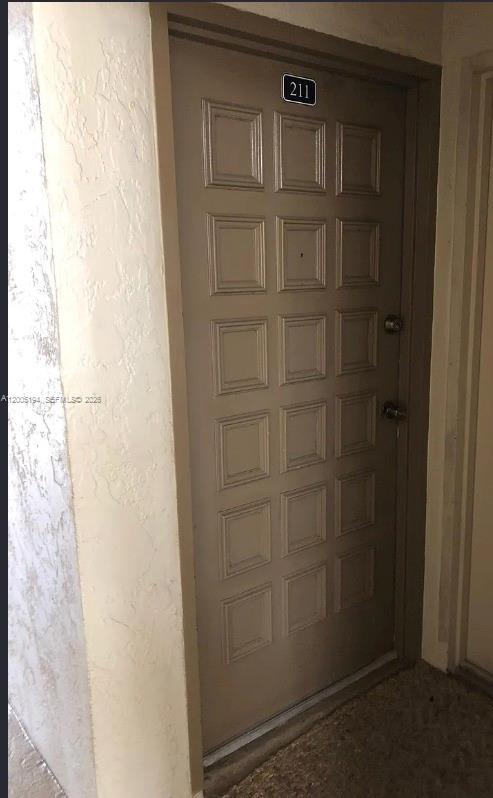 7705 Southwest 86th Street, Unit B211 Miami, FL 33143 - Photo 16 of 22 a close up of a shower
