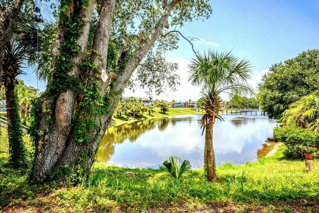 a view of a lake with a garden