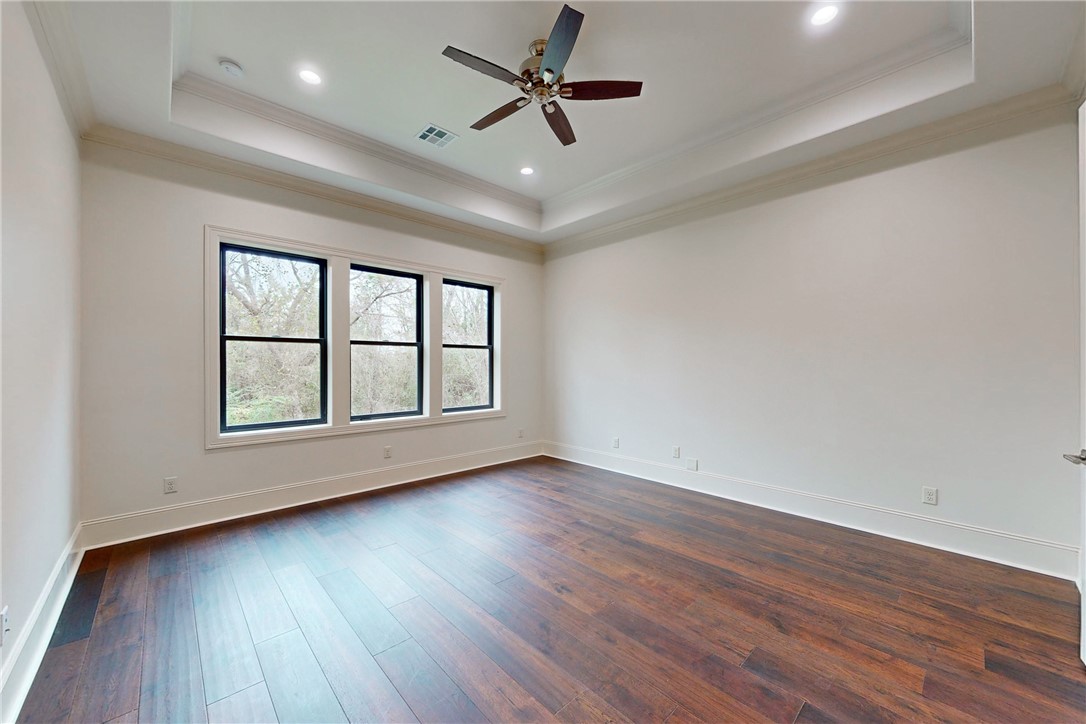 3317 Legacy Court Bryan, TX 77802 - Photo 9 of 28 wooden floor in an empty room with a window