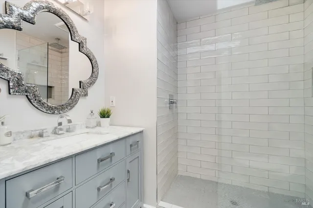 a bathroom with a sink and a mirror