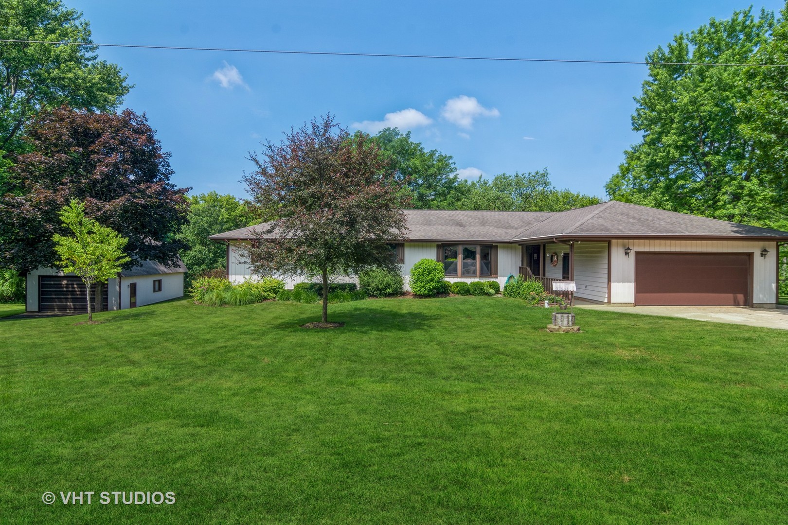 1N400 Pouley Road Elburn, IL 60119 - Photo 1 of 50 a front view of a house with a garden
