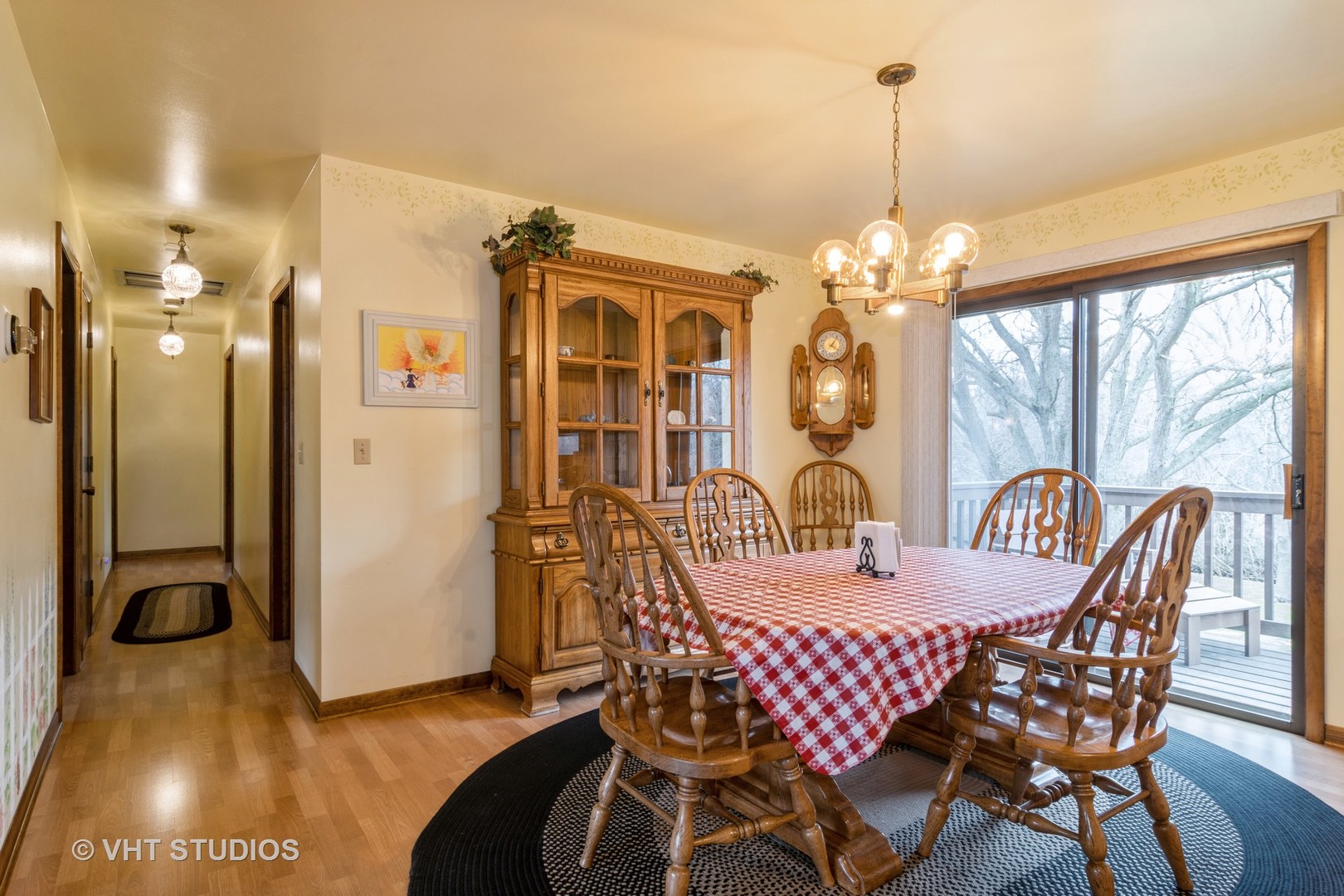 1N400 Pouley Road Elburn, IL 60119 - Photo 13 of 50 a view of a dining room with furniture wooden floor and chandelier