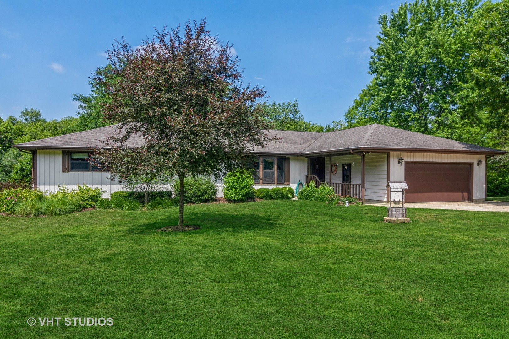 1N400 Pouley Road Elburn, IL 60119 - Photo 2 of 50 a front view of a house with a garden