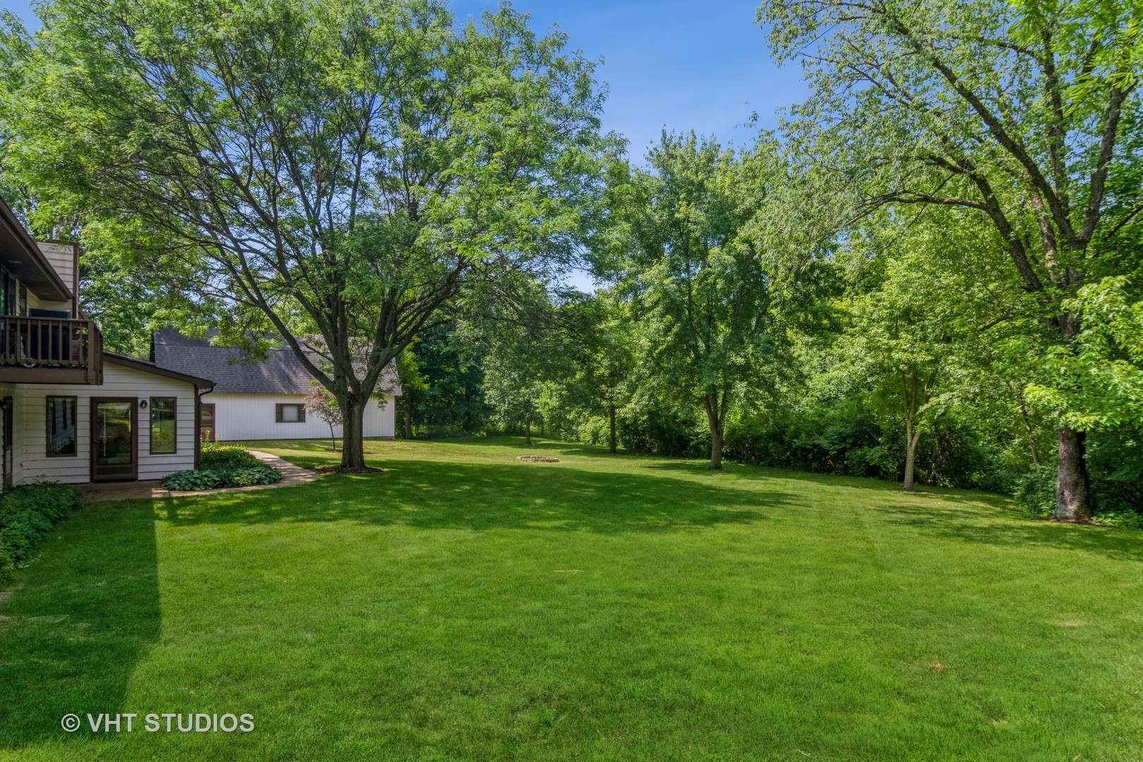 1N400 Pouley Road Elburn, IL 60119 - Photo 50 of 50 a view of a big yard with a house in the background