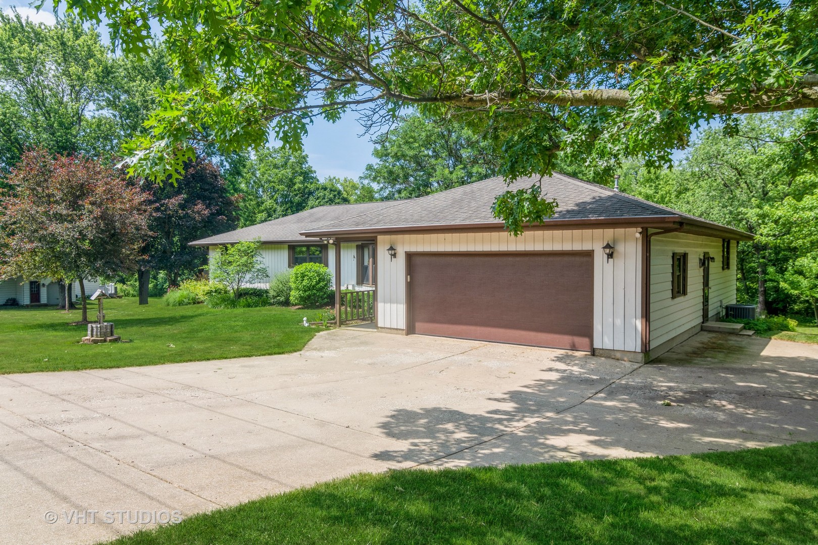 1N400 Pouley Road Elburn, IL 60119 - Photo 6 of 50 a front view of a house with a yard and garage