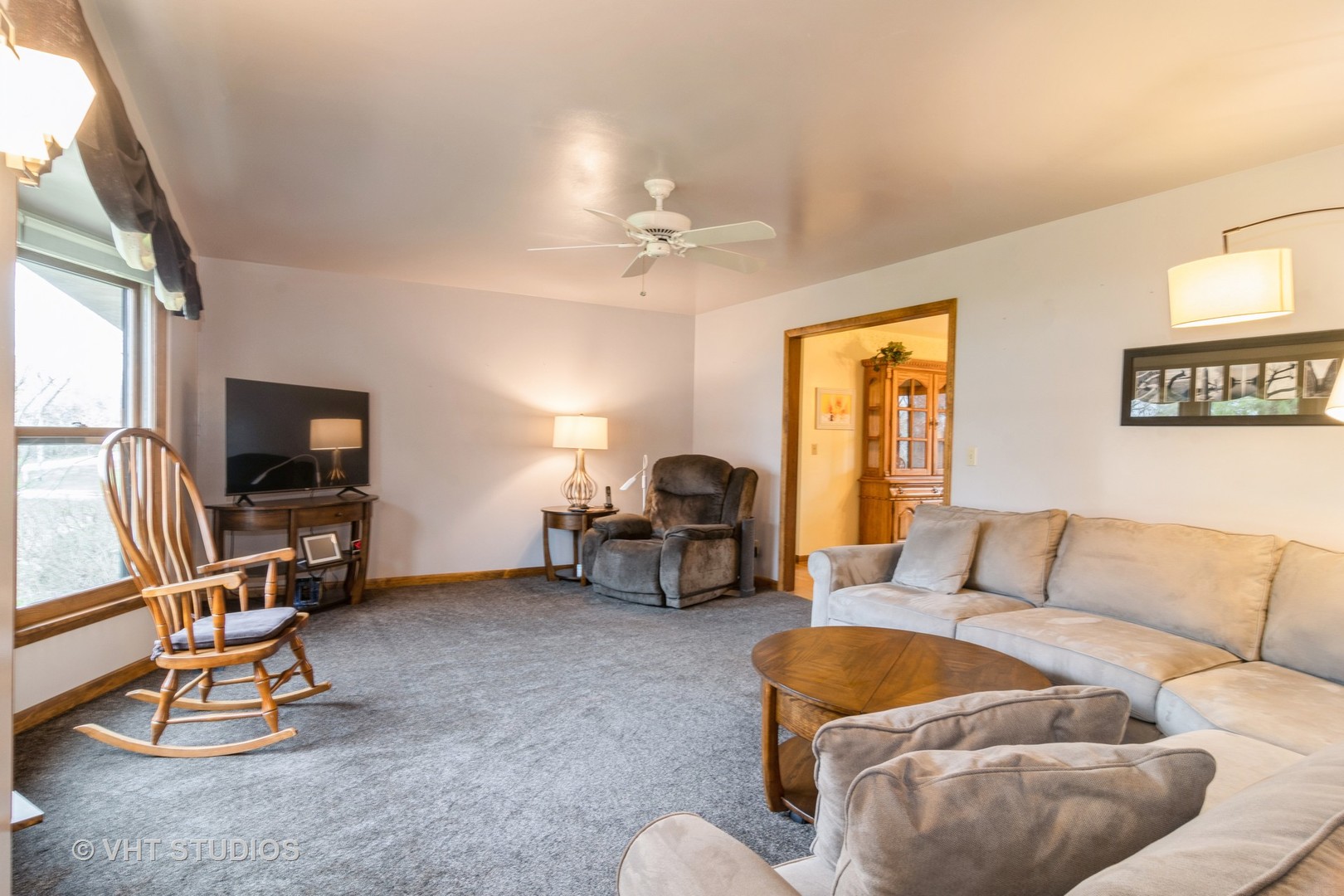 1N400 Pouley Road Elburn, IL 60119 - Photo 7 of 50 a living room with furniture gym equipment and a flat screen tv