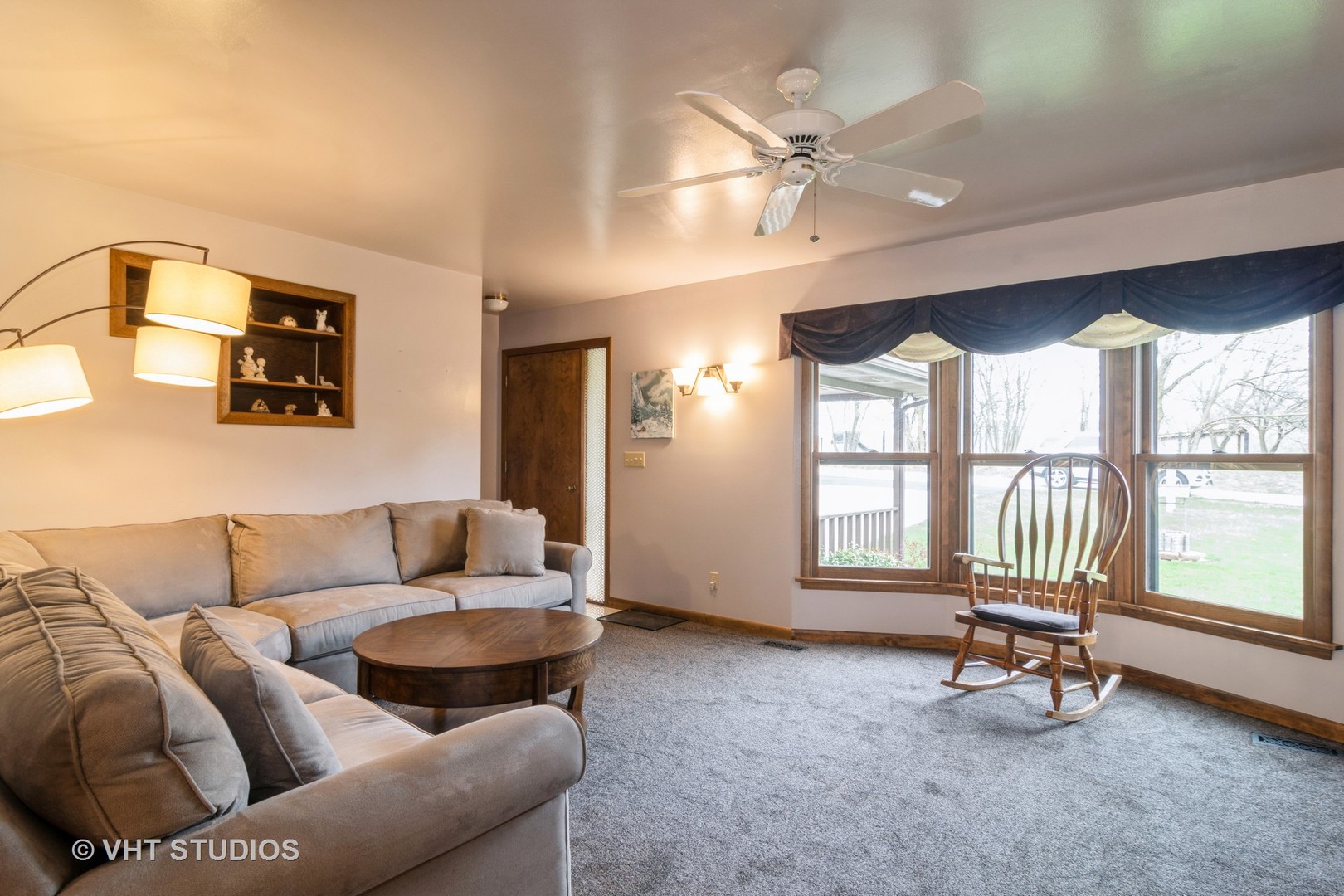 1N400 Pouley Road Elburn, IL 60119 - Photo 8 of 50 a living room with furniture and a floor to ceiling window