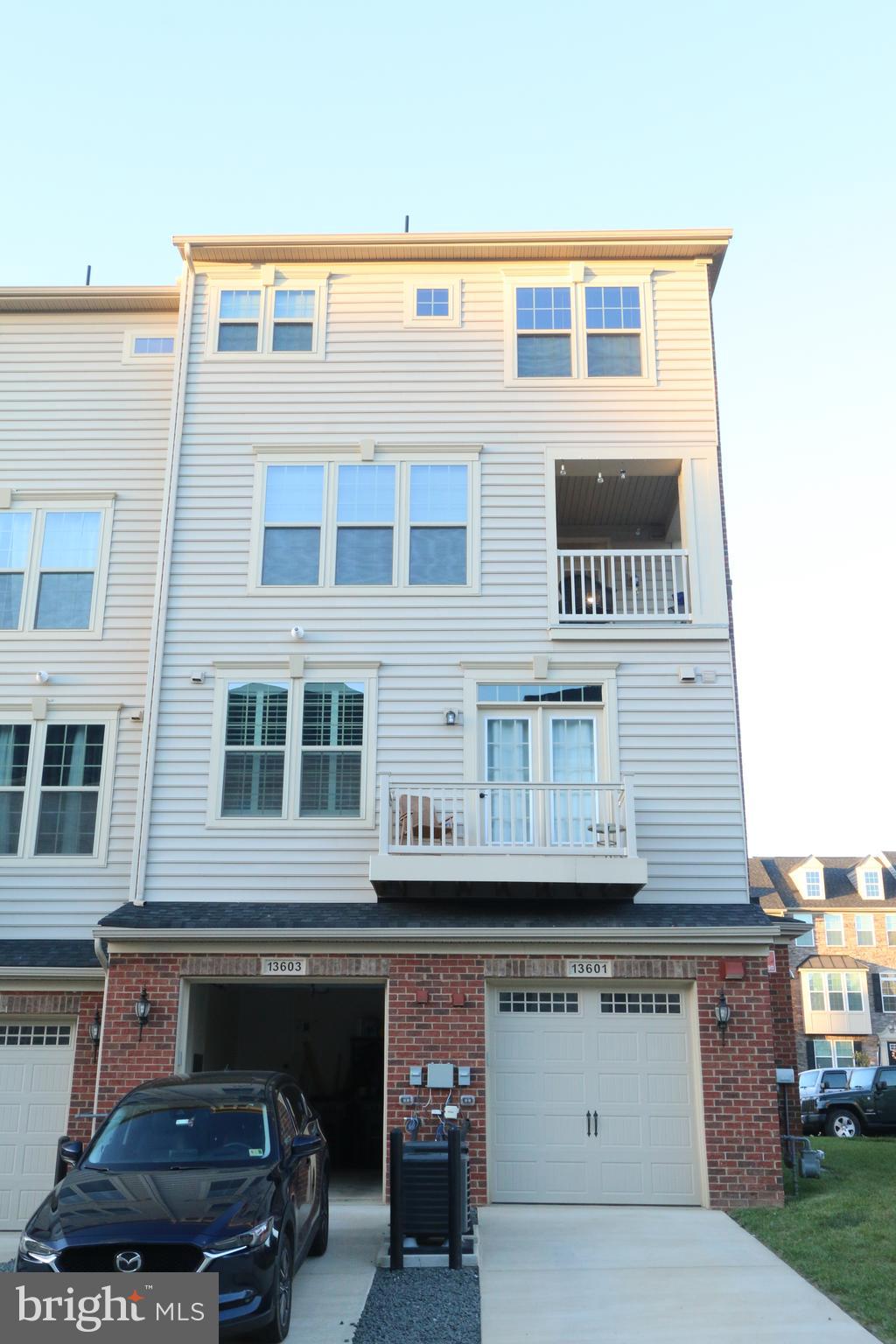 13603 Rockingham Lane Gainesville, VA 20155 - Photo 29 of 36 Rear of Unit. One Car Garage and Parking