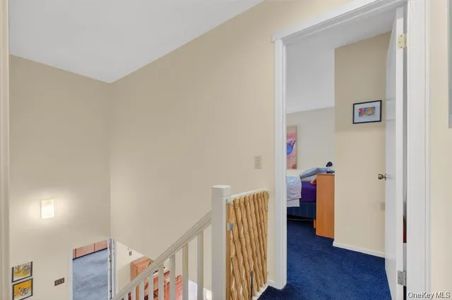 a view of a livingroom with wooden floor