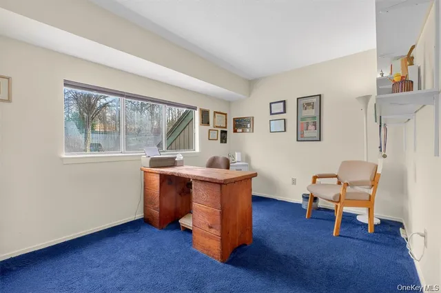 a room with furniture and a window