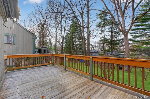 a view of deck with a trees